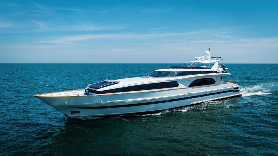 A luxurious white motor yacht embracing new opportunities on the vast ocean.