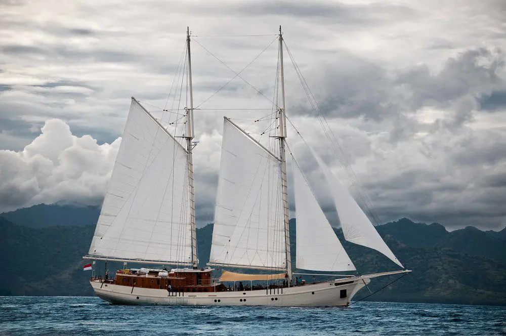 A luxurious yacht navigating the vast ocean.