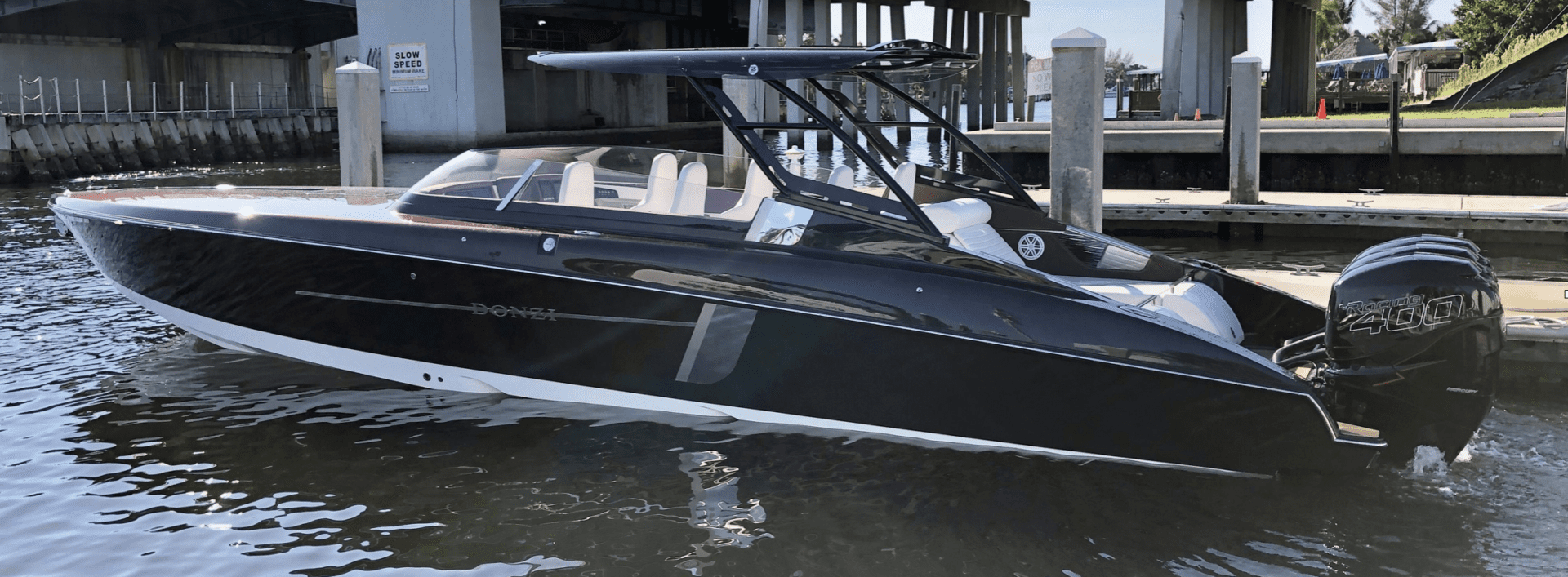 A 2020 Donzi 41 GTZ boat docked in the water.