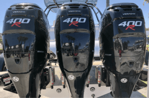 A sleek 2020 Donzi 41 GTZ boat showcases four powerful outboard motors gracefully parked on its side, making it a top choice for sale.