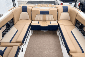 2023 Master Craft X24 for Sale: The interior of this boat showcases comfortable blue and tan seats.