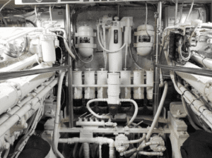 A black and white photo of a Tarrab 112 ship's engine room.