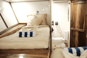 In 2024, the KLM Sinar Pagi boat cabin provides two beds and a toilet.